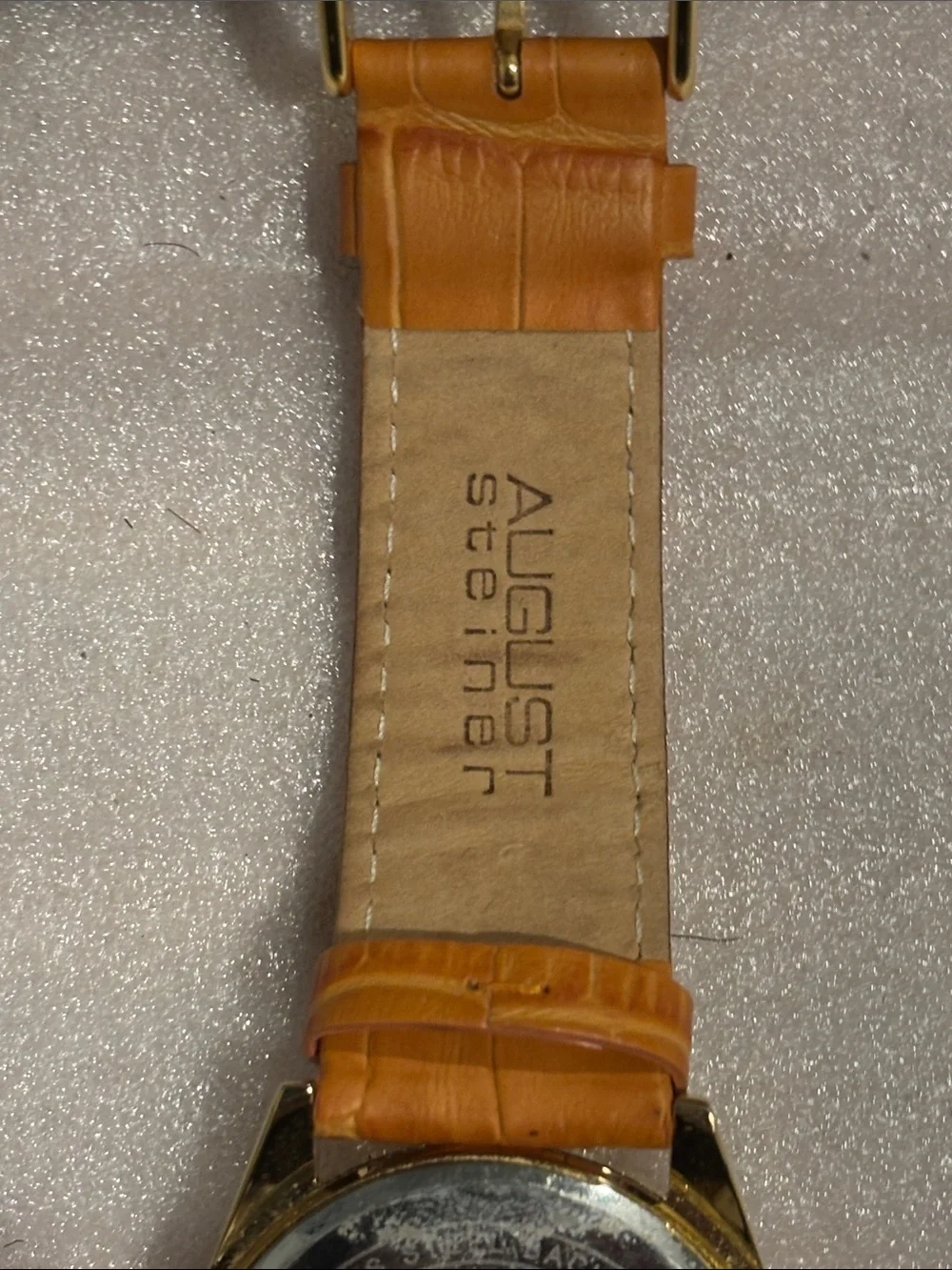 August Steiner Gold Case Silver Dial Watch with Orange Leather Strap